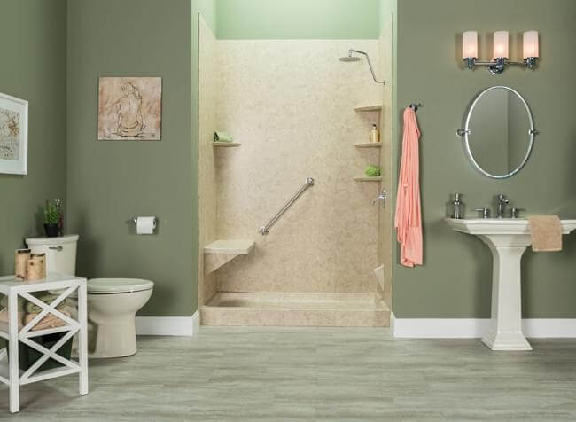 larger bathroom with green paint and shower in the back middle