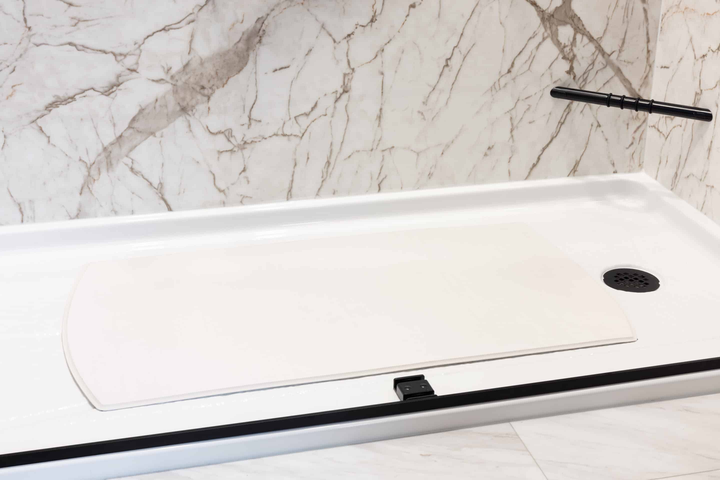 bath mat for bathroom accessibility and safety on recently renovated walk in shower