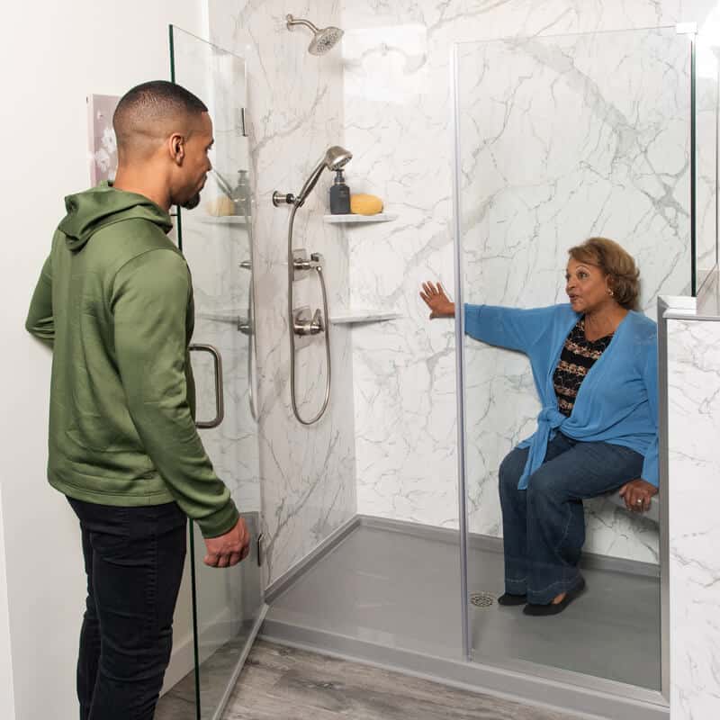 porcelain-tile-shopping two people shopping for porcelain tile showers in local showroom