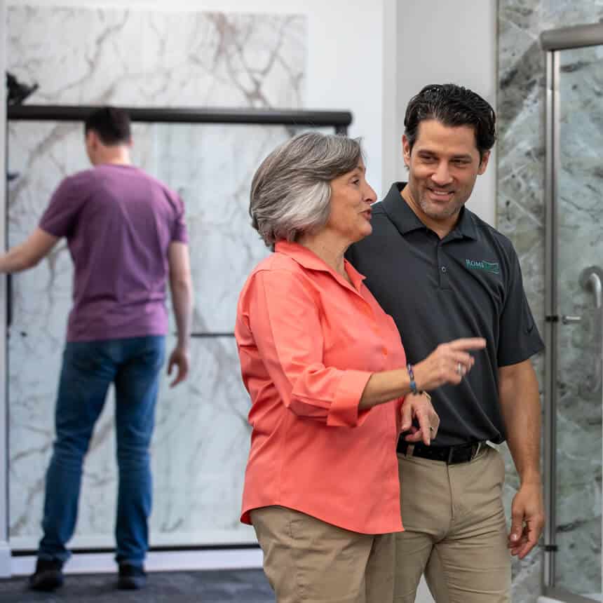 rome bath remodeling design consultant helping older woman with bathroom remodel