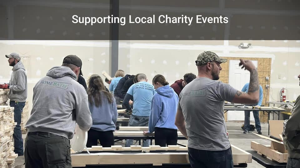 bath remodel employees at local charity event