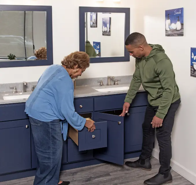 two customers exploring vanity options inside of design center and showroom