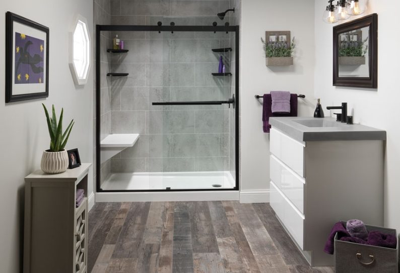 bathroom remodel including flooring vanity mirrors lighting shower glass door fixtures and seat