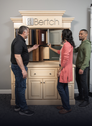 Rich Rome discussing cabinetry options with couple at the Rome Bath Remodeling showroom