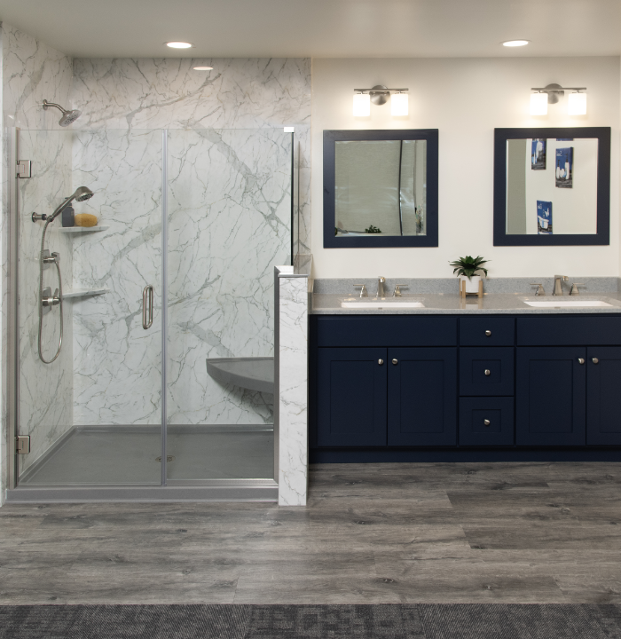 full bathroom with walk-in shower in wall surround color Santorini White