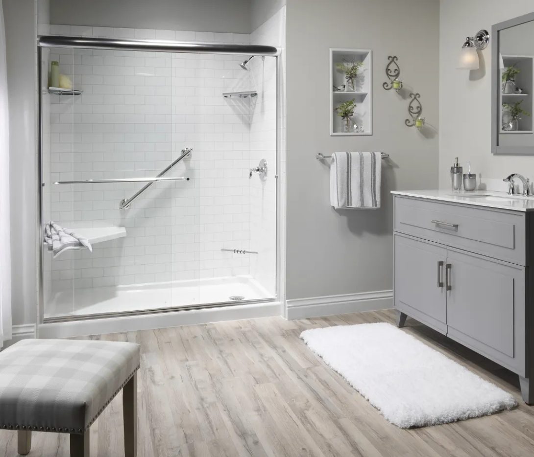 full bathroom with walk-in shower with etched acrylic wall surrounds in the color grayline