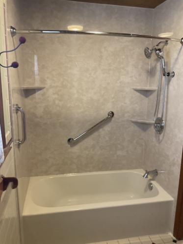 updated shower and bath tub remodel with new fixtures